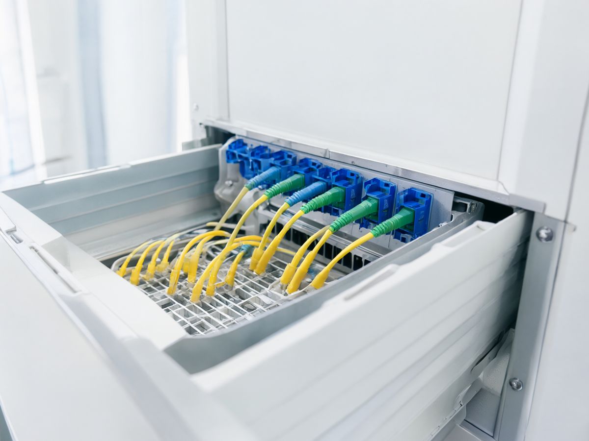 An open fibre patch panel drawer in a rack